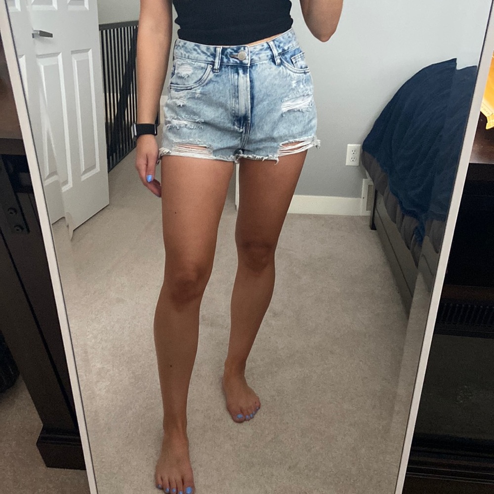 Distressed denim shorts
